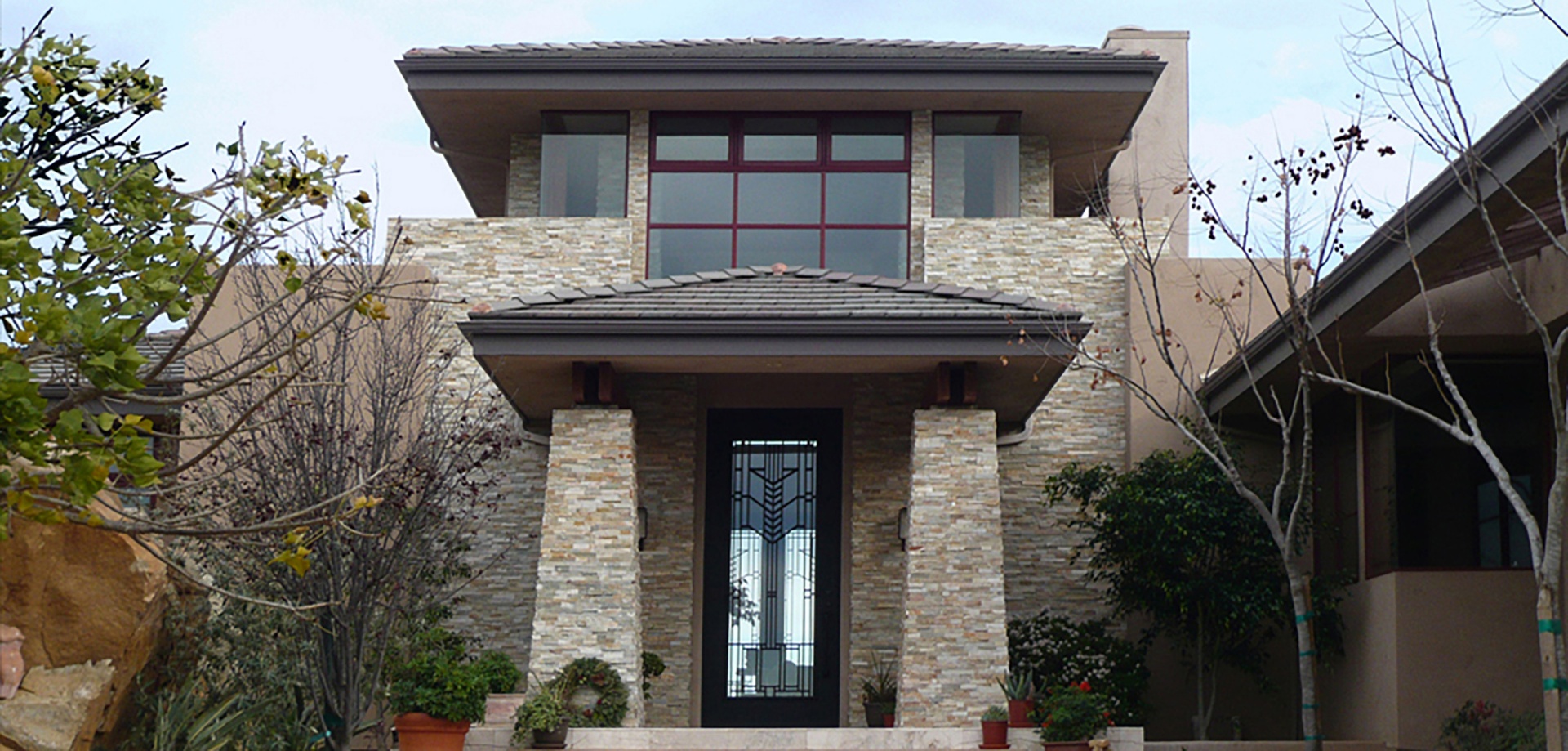 Lake Hodges Retreat — stone entry facade