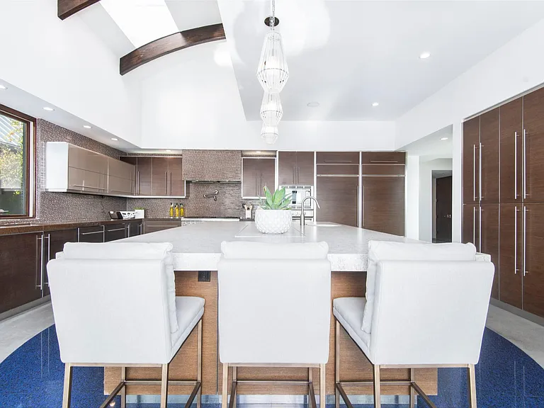 San Diego Family Estate — chef's kitchen with island seating