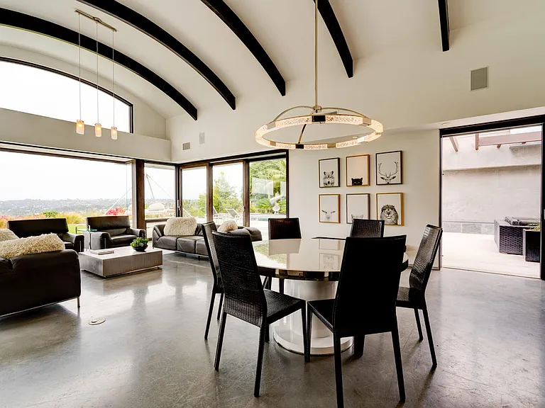 San Diego Family Estate — arched-beam ceiling over living and dining
